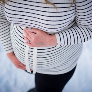 Black and beige striped maternity sweater